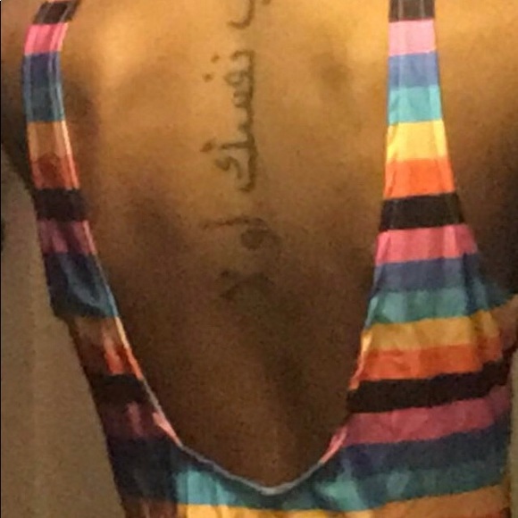 Rainbow jumpsuit
Size small stretchy - Picture 3 of 3